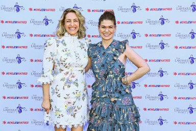 two woman in dresses at a fundraiser for #EndJewHatred