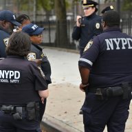 police in uniform investigating a scene in Canarsie, Brooklyn