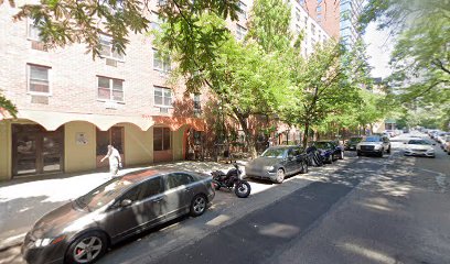 Hell's Kitchen street with parked cars