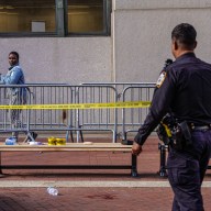 Police investigate scene near City Hall where man was stabbed