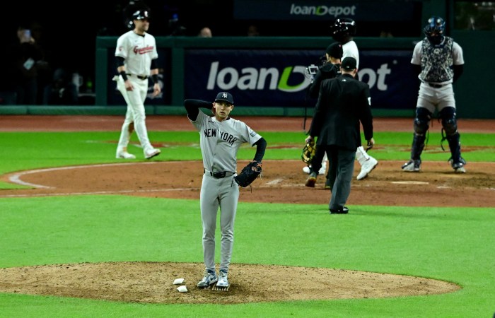 Oct 17, 2024; Cleveland, Ohio, USA; New York Yankees pitcher Luke Weaver (30) reacts after giving up a two-run home run during the ninth inning against the Cleveland Guardians in game 3 of the American League Championship Series at Progressive Field.