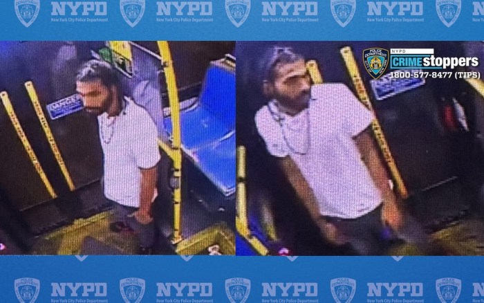 suspect wearing white shirt who allegedly shot two men in the Bronx