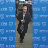 man in a long dark coat who allegedly abused a woman near Times Square