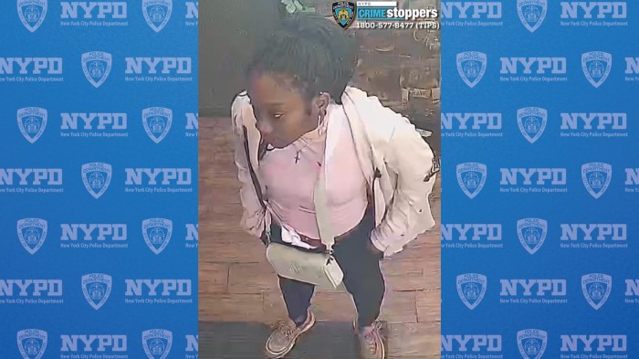 woman wearing white sweater wanted for random attack in Lower Manhattan