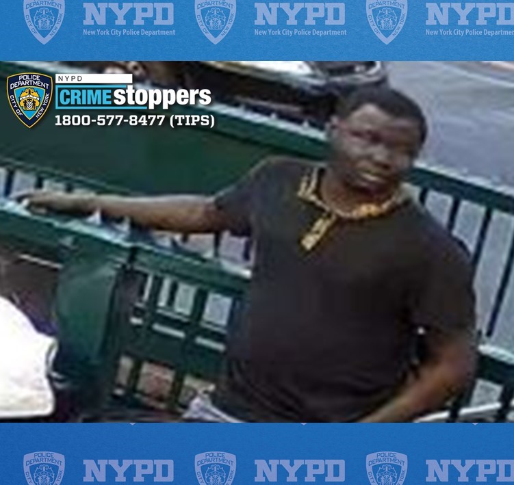 man wearing dark colored clothes wanted for allegedly taking part in a random attack in SoHo