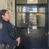 Cop in lobby of Harlem building where boy was found dead