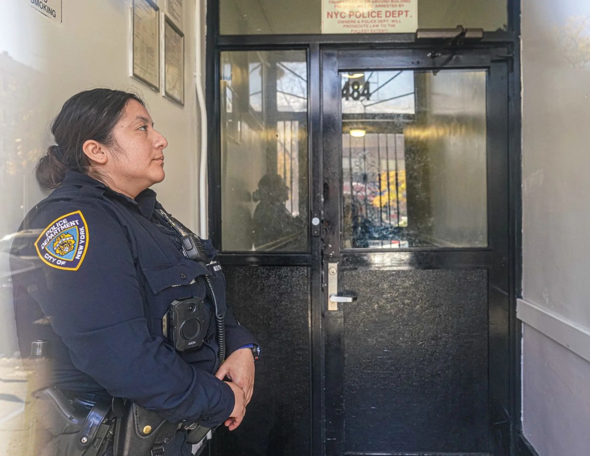 Cop in lobby of Harlem building where boy was found dead