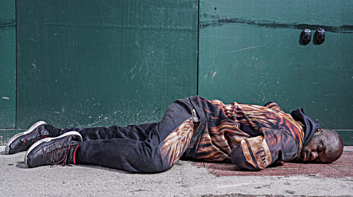 Man sleeps on Garment District sidewalk