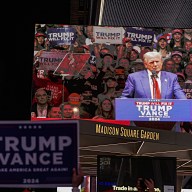 People outside Madison Square Garden watching Donald Trump, the former president, speak during his rally at the arena on Oct. 27, 2024.