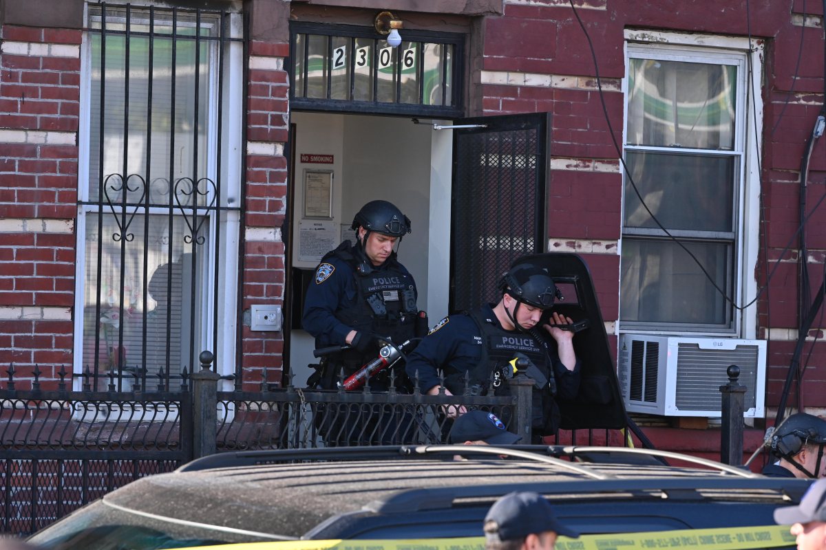 police at the scene where A suspect held officers at bay following a two hour stand off following of a stabbing homicide.