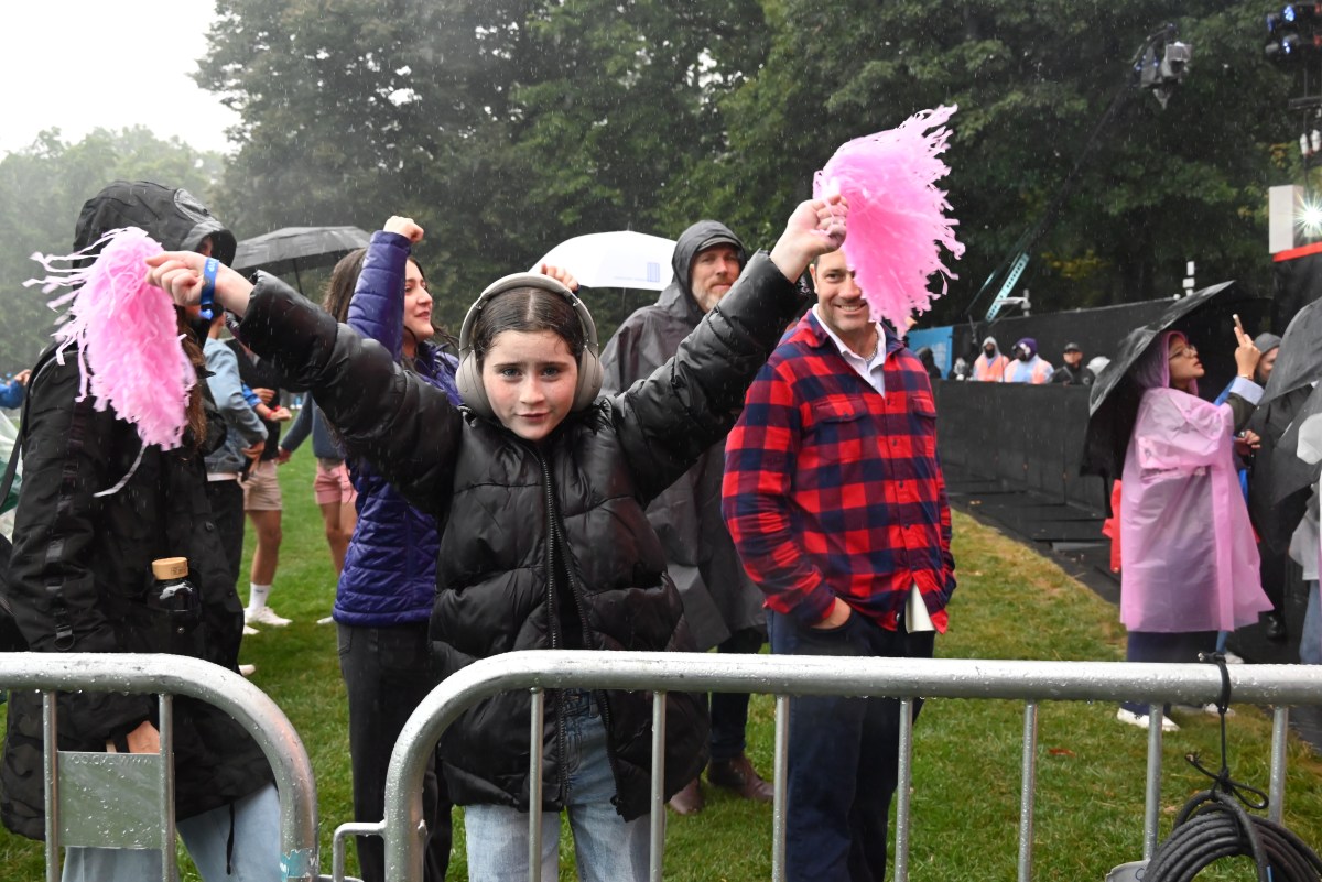 Fans at Global Citizen Fest braved the rain.