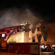 firefighters work on a fire at at Staten Island church