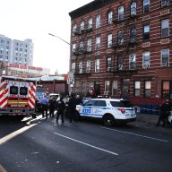 police and EMS at a stabbing in Brooklyn