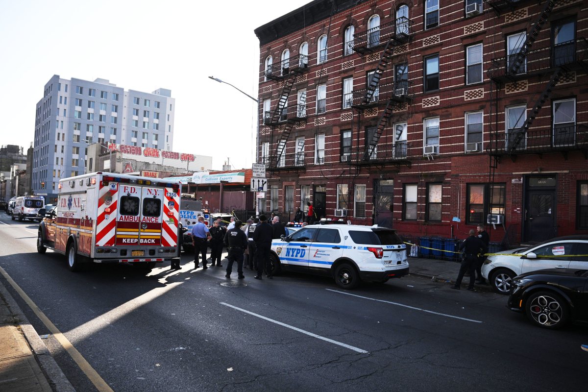 police and EMS at a stabbing in Brooklyn