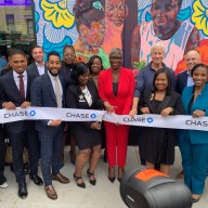 people cutting the ribbon for a new bank branch in Bed-Stay