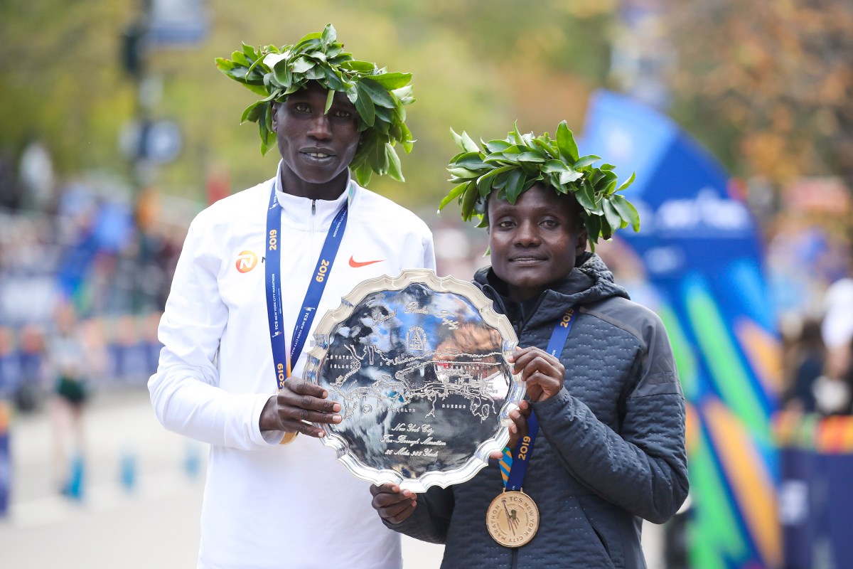 Geoffrey Kamworor (left) during the 2019 NYC Marathon.