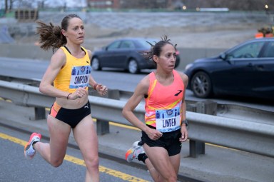 Jenny Simpson (left) running