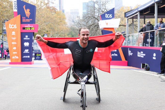 Marcel Hug at the 2023 New York City Marathon finish line.