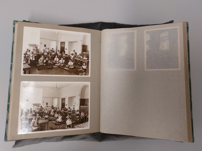 vintage photo album of Anne Frank that is an artifact at a replica of Anne Frank's hiding place