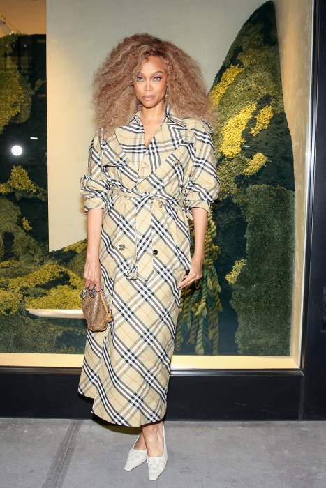 Tyra Banks in a dress at Burberry reopening in Midtown