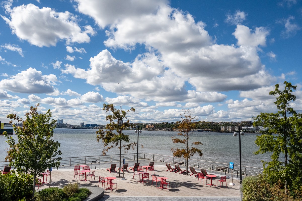 The southern edge of Pier 97 features lounge chairs and bistro tables.