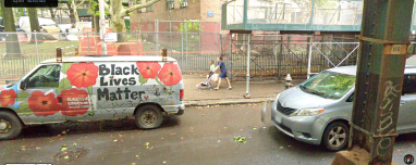 cars parked outside Bronx apartment building