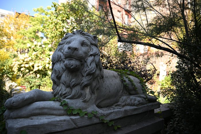 Statue of a lion in Elizabeth Street Garden in SoHo