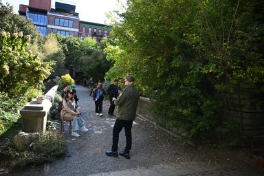 people walking through Elizabeth Street Garden