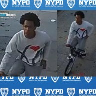 man wearing white shirt on a bike who allegedly stabbed a man on Staten Island