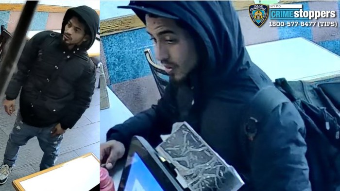 suspect wearing a dark-colored hood who allegedly robbed a woman in Midtown