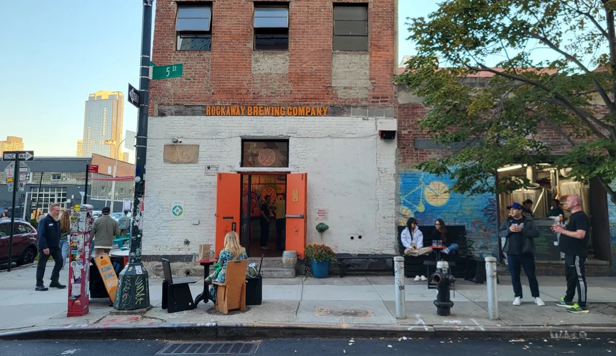 Guests enjoy a fall day inside and outside Rockaway Brewing Co. in Long Island City.
