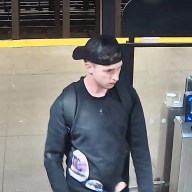 suspect wearing a black hat and black shirt who allegedly burglarized a shop in Grand Central Terminal