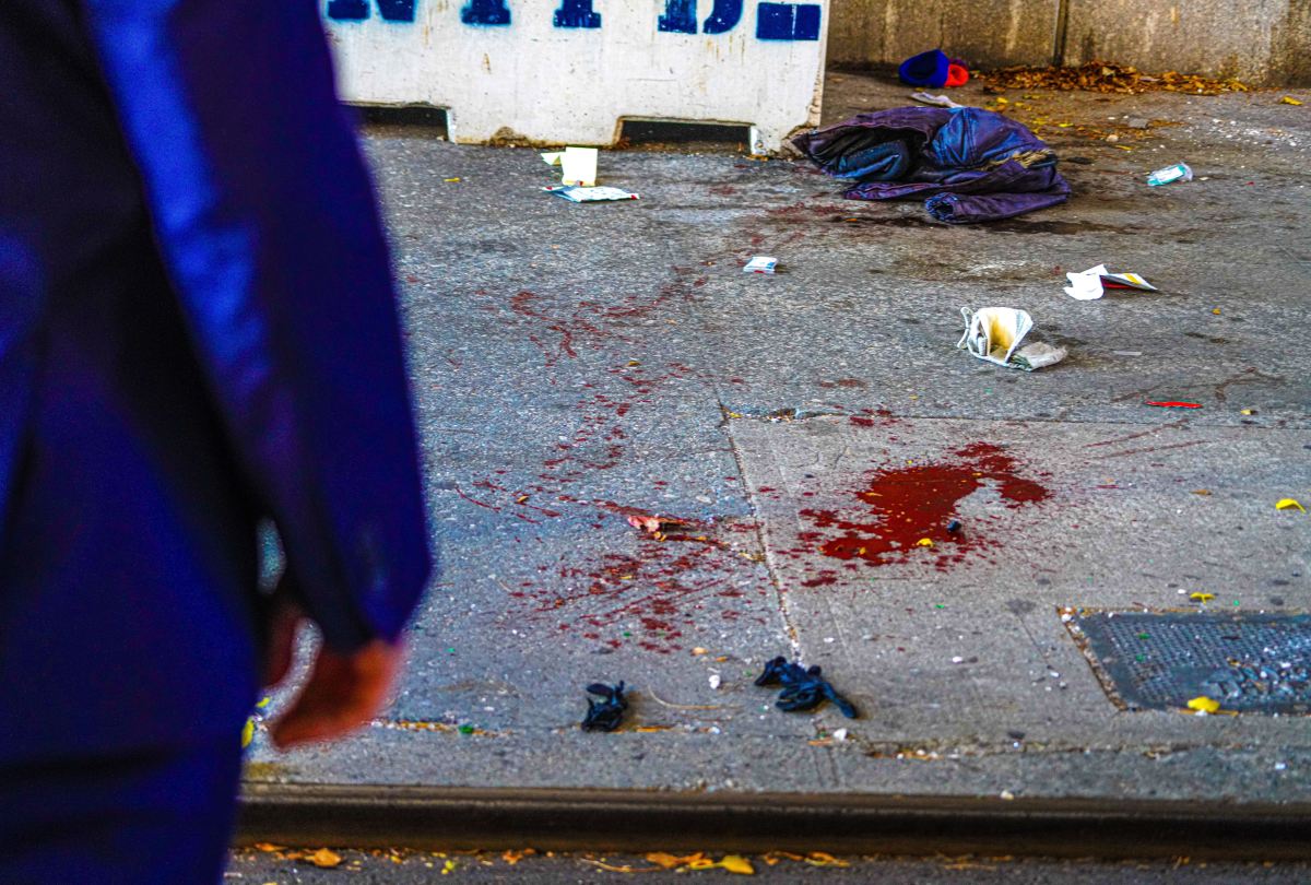 Blood covers the sidewalk where a woman was stabbed at the corner of 42nd Street and 1st Avenue on Nov. 18, 2024.