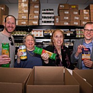 Met Council and pols with Thanksgiving food items donated to needy