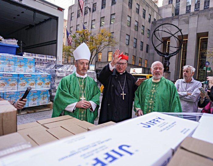 Cardinal Dolan blessing food donations