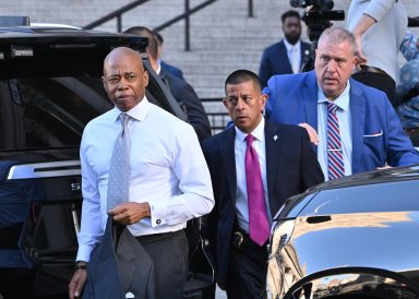 Mayor Eric Adams exits federal court following a Nov. 1 conference in his federal corruption case. District Court Judge Dale Ho set an April 21, 2025 trial date for Adams.