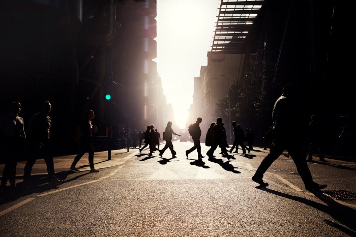 Business people walking at work in a city