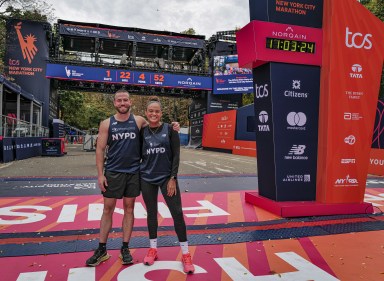 NYC Marathon runners representing the NYPD