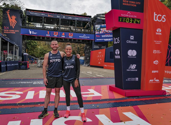 Police Officer Tim Miley (left) and Sergeant Katherine Guerrero prepare for the New York City Marathon.