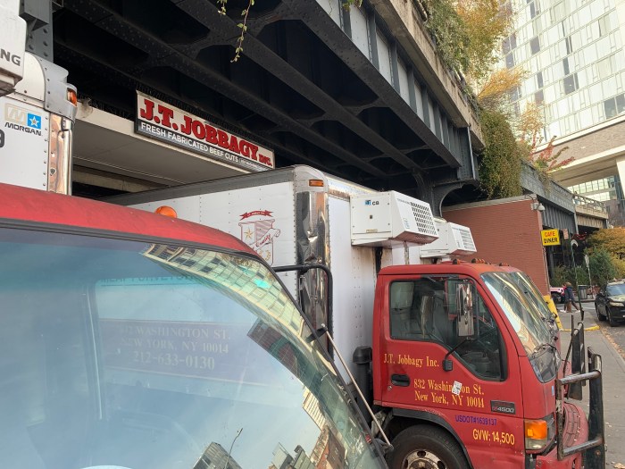 fleet of red and white trucks