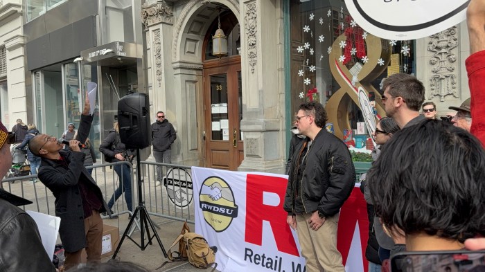 workers outside a book store in Union Square