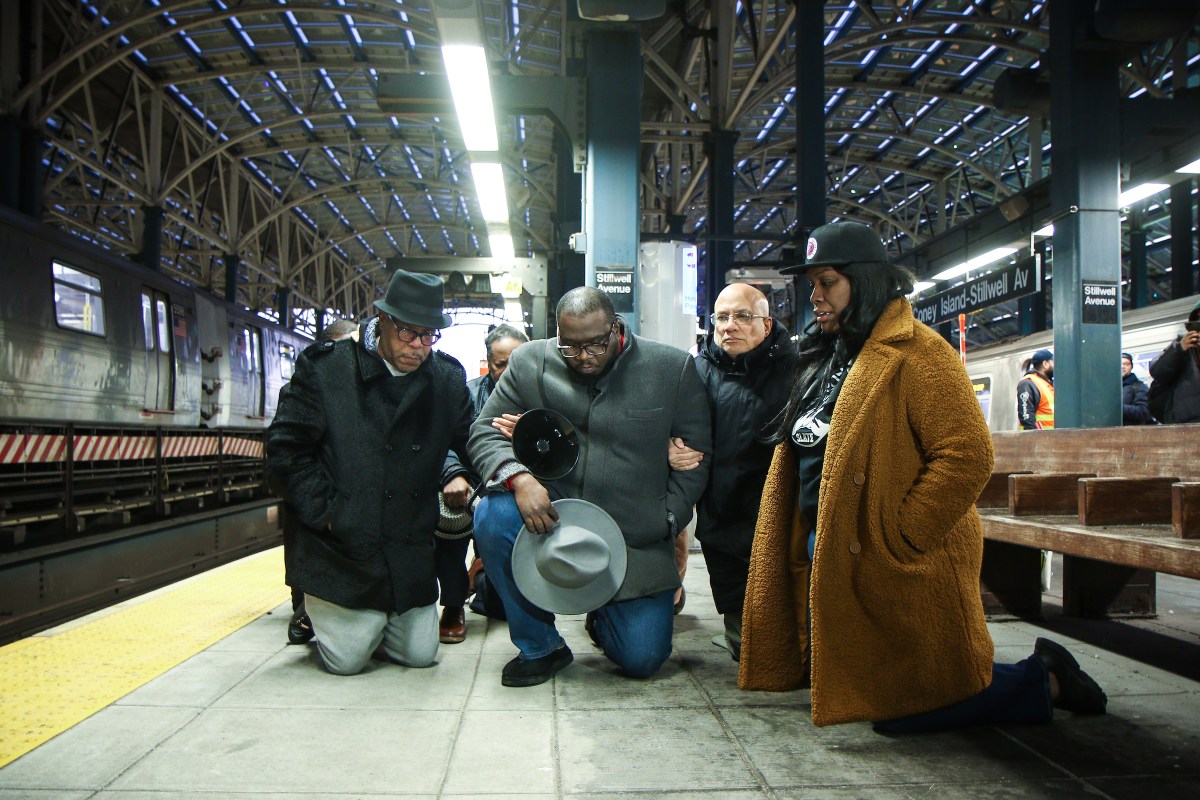 Advocates in Brooklyn kneel at subway station where woman was burned alive