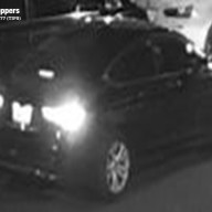 The getaway car shown in surveillance footage after a fatal shooting in Brooklyn.