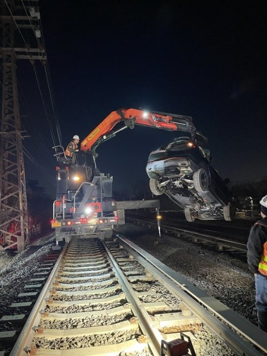 Alleged drunk driver's car removed from LIRR tracks