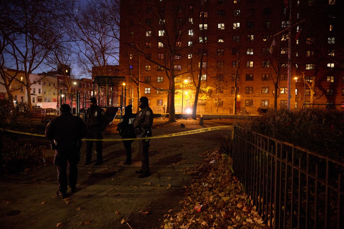 Police at the scene of a shooting at a NYCHA complex in Brooklyn.