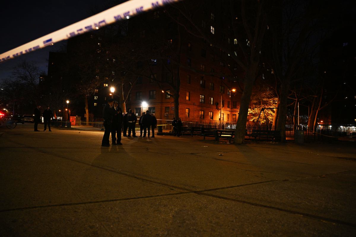 Police at the scene of a shooting at a NYCHA complex in Brooklyn.