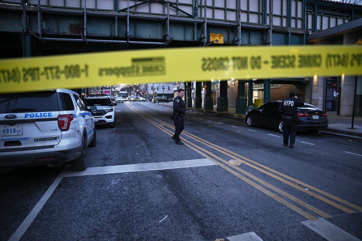 Police investigate a double shooting at the Avenue U Q train station on Avenue U and East 15th St. in Brooklyn on Dec. 21, 2024.