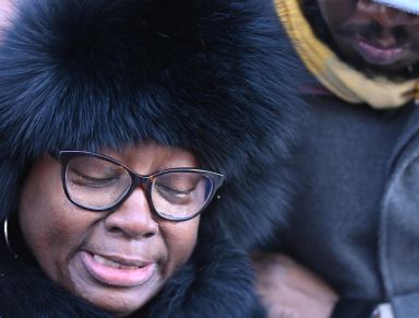 Yolanda Campbell cries out for her son a day after he was killed in a police involved shooting at Utica Avenue and Park Place in Crown Heights, Brooklyn on December 5.