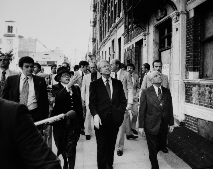 US President Jimmy Carter visits the South Bronx in New York, accompanied by Patricia Harris (left, 1924 - 1985), Secretary of Housing and Urban Development, and Mayor Abe Beame (right) on Oct. 5, 1977.