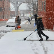 Snow shovelers at work